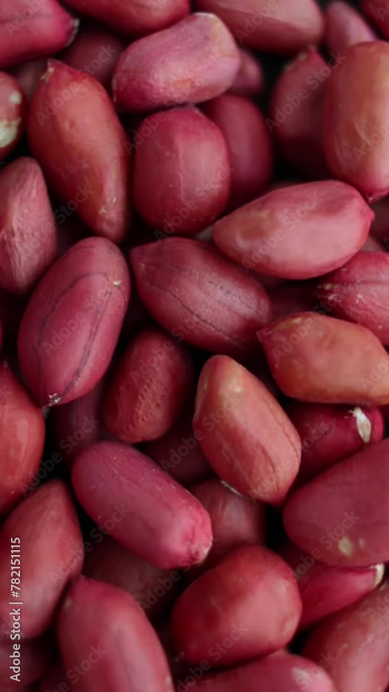 Top view: Peanuts heap rotating with close up shot. Vertical video. Top view: Peanuts heap rotating with close up shot. Vertical video.