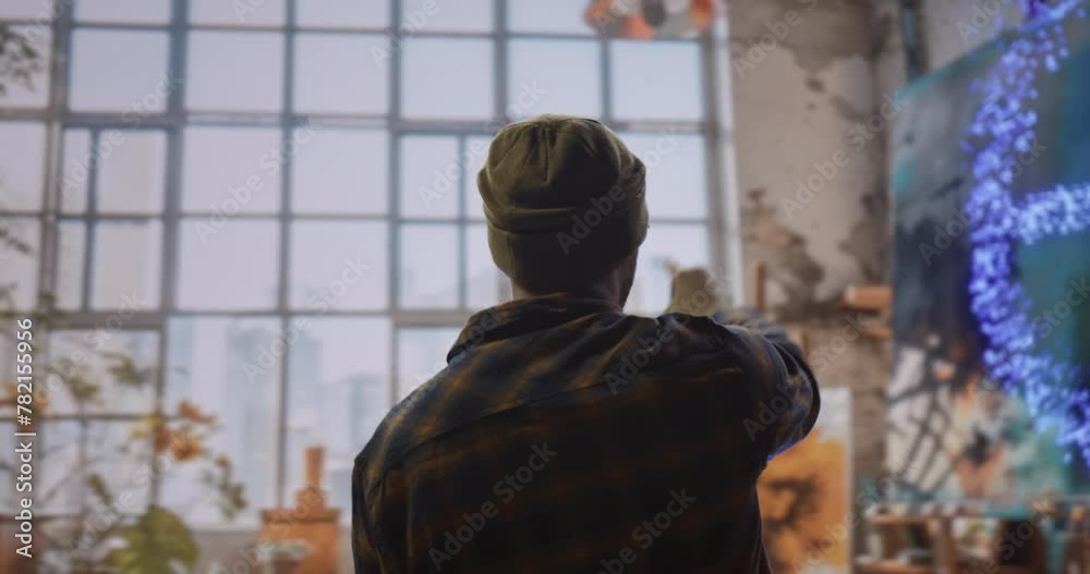 A Man Standing In Front Of A Painting On A Easel Abandoned Warehouse Interior Video Art Painting A Man Standing In Front Of A Painting On A Easel Abandoned Warehouse Interior Video Art Painting