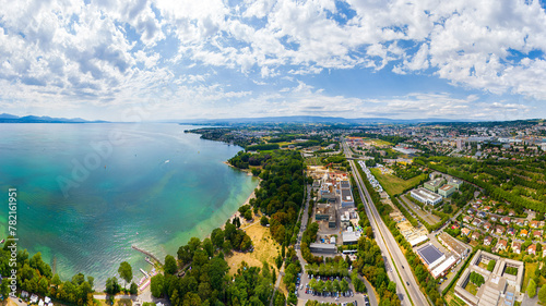 Lausanne, Switzerland. Lake embankment and city panorama in summer. Aerial view photo