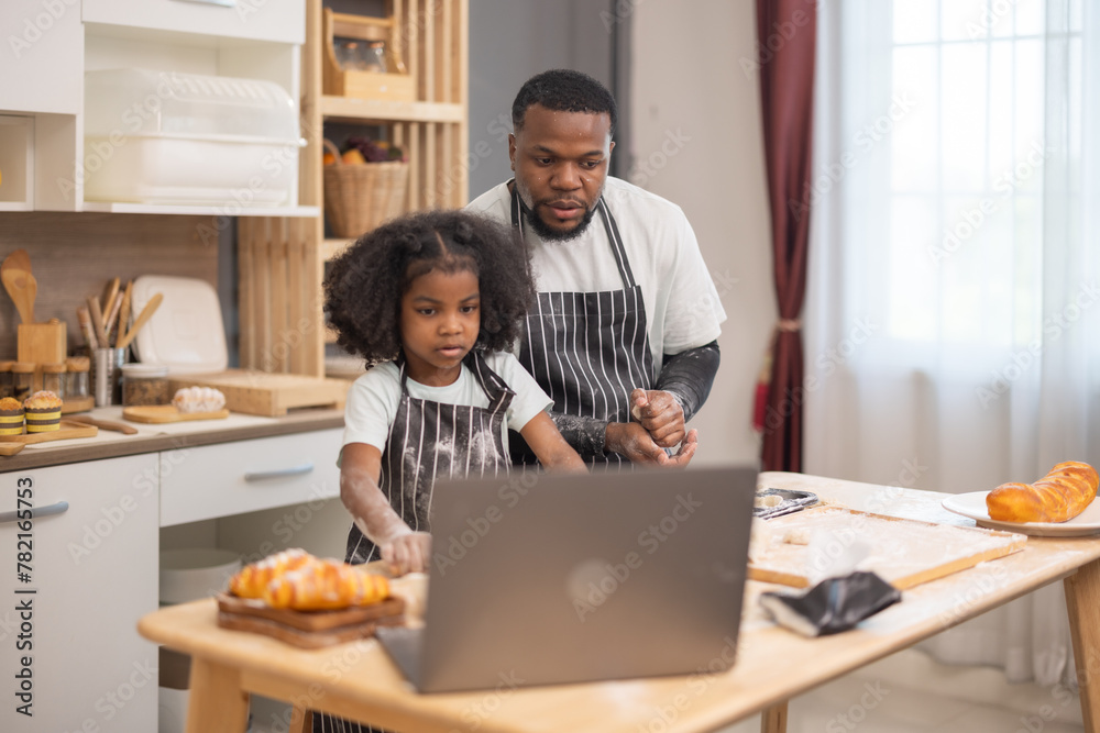 Family Bonding Over Baking Bread Using Online Recipe in Cozy Home Kitchen