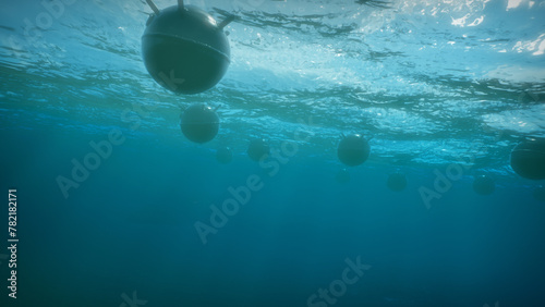Mines float on the waves in the ocean