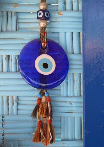Dusty Old Turkish Evil Eye Charm on The Wall at Restaurant in Famagusta, North Cyprus