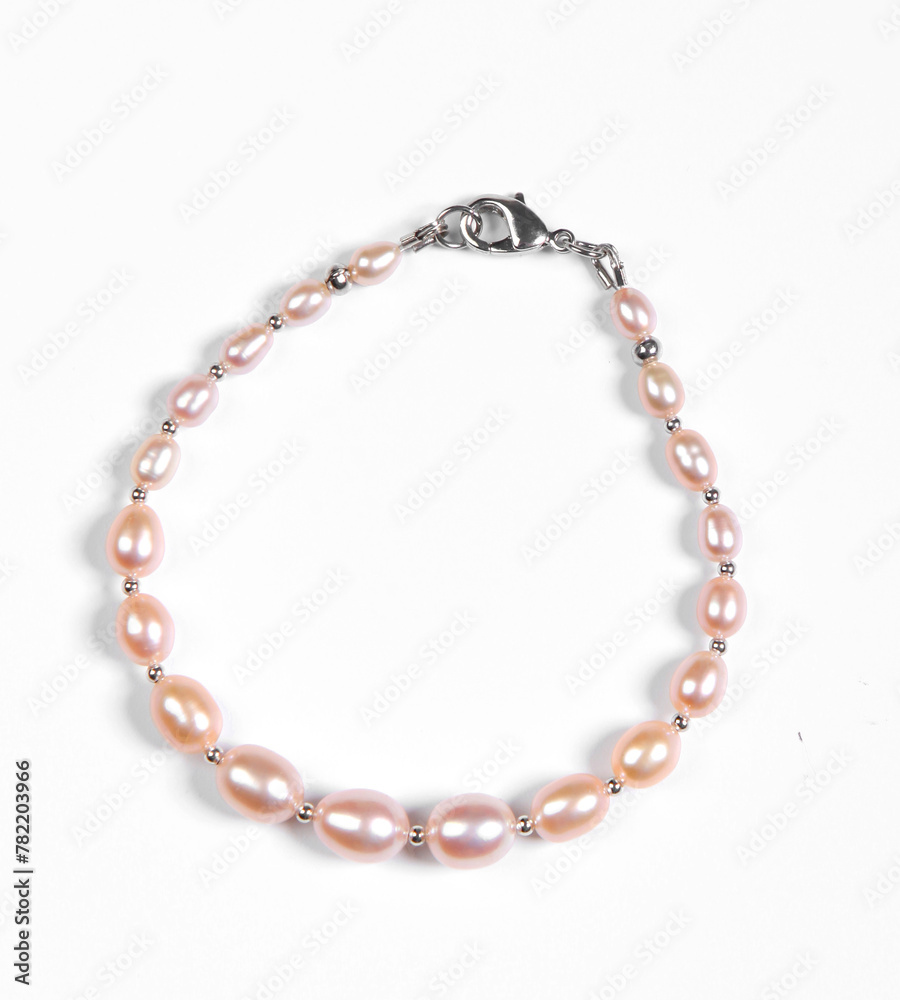 Baroque pearl bracelet isolated on white background. Top view Baroque pearl bracelet isolated on white background. Top view