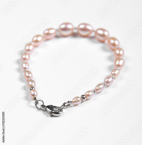 Baroque pearl bracelet isolated on white background. Top view