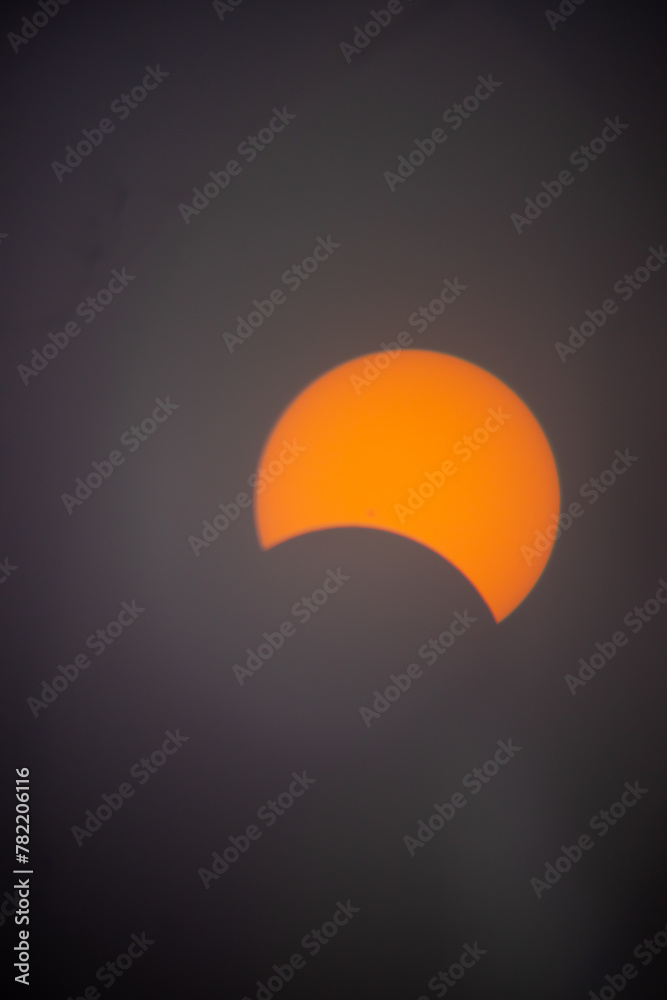 This is the solar eclipse seen from Pennsylvania on April 8th, 2024. This is only partial and not full. The beautiful fireball is being covered by the moon. The oranges and yellows are so bright. This is the solar eclipse seen from Pennsylvania on April 8th, 2024. This is only partial and not full. The beautiful fireball is being covered by the moon. The oranges and yellows are so bright.