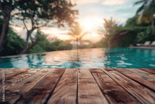 A wooden deck by a sparkling swimming pool, ideal for travel brochures