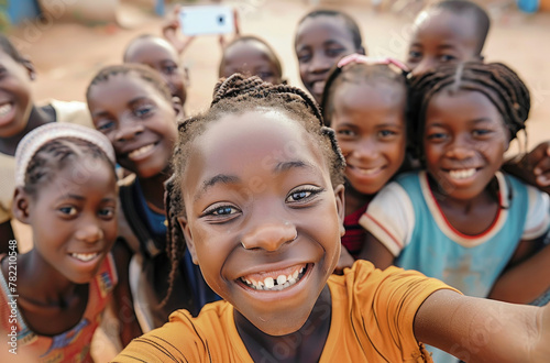 a group of smiling african school children taking selfie in the streets, nigerian village