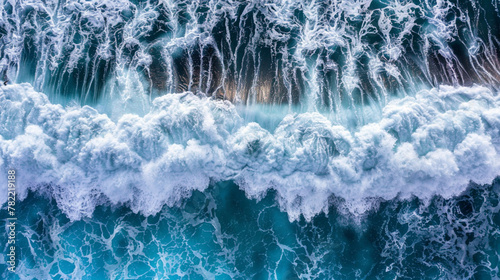A large wave crashing into the shore
