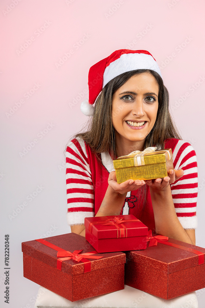 Female santa holding presents Female santa holding presents