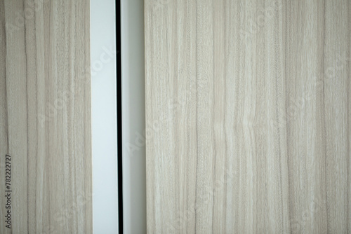 Wood texture Vinyl plank attached to wall.