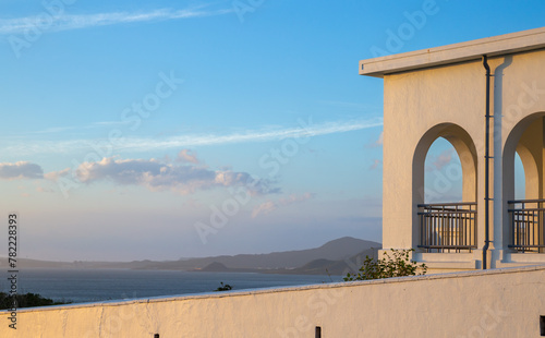 white house with sunset sky, Cape Eluanbi, Taiwan photo