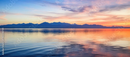Sunset over mountain lake © HN Works