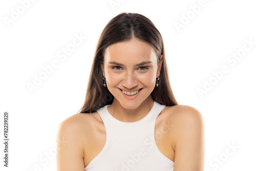 portrait of a young smiling teenage girl on a white background