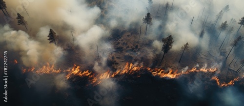 Truck Tire Next to Fire on Dirt Road