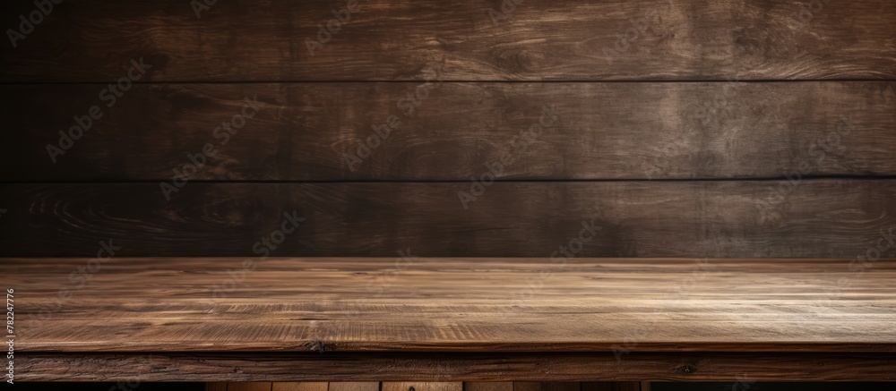 Wooden table on a dark backdrop Wooden table on a dark backdrop