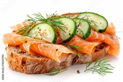 A delectable open-faced sandwich with smoked salmon, cucumber, and dill on seeded bread, a light and healthy option.