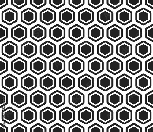 Abstract background with geometric mosaic shapes. Bold rounded hexagon cells with padding and inner solid cells. Hexagonal cells. Seamless tileable vector illustration.