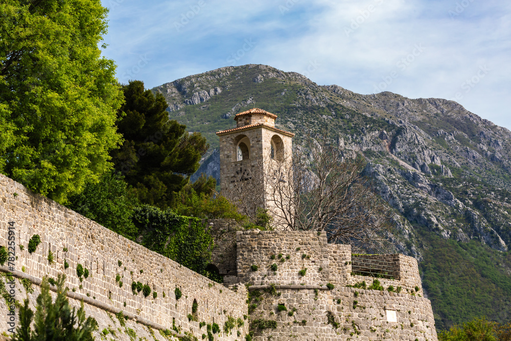Venetian citadel in Old Bar, Montenegro, with lush foliage and mountain views, ideal for historical and travel themes