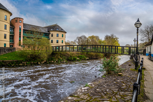 A view along the banks of the River Cleddau beside the weir in Haverfordwest, Pembrokeshire, Wales on a spring day photo