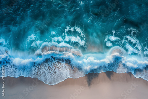 Aerial view to ocean waves. Blue water background, top view