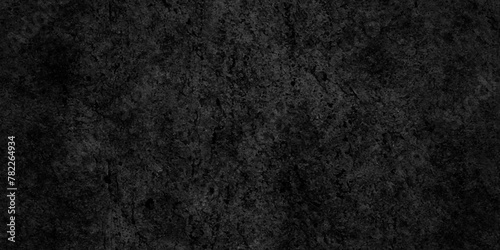 Abstract black stone wall texture grunge rock surface. dark gray background backdrop. wide panoramic banner. old wall stone for dark black distressed grunge background wallpaper rough concrete wall.