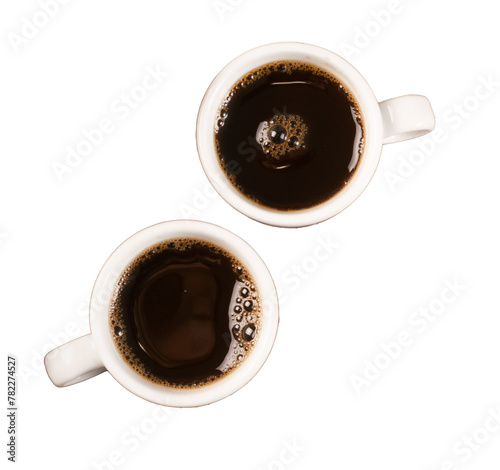 Hot coffee cup and coffee beans on brown background top view photo