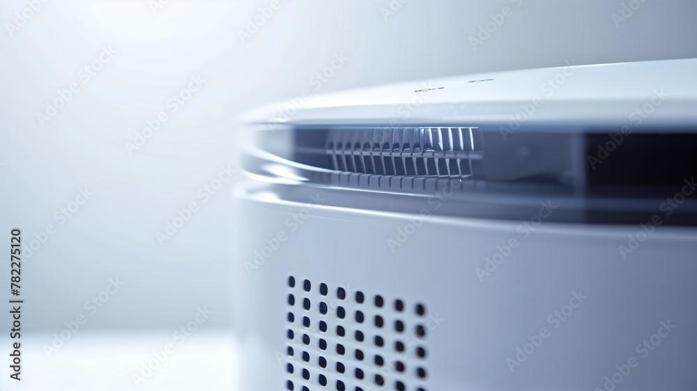 Close-up of a modern air purifier in a home environment. Concept of health and clean air technology. Design for product brochure, technology blog Close-up of a modern air purifier in a home environment. Concept of health and clean air technology. Design for product brochure, technology blog