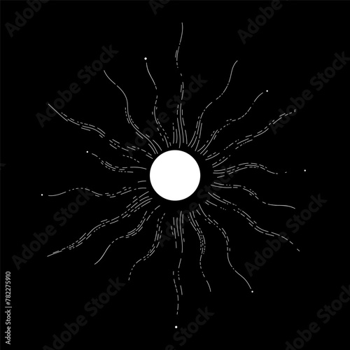 Stilized sun symbol on black background photo