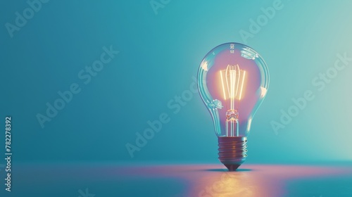 Glowing light bulb on a blue background