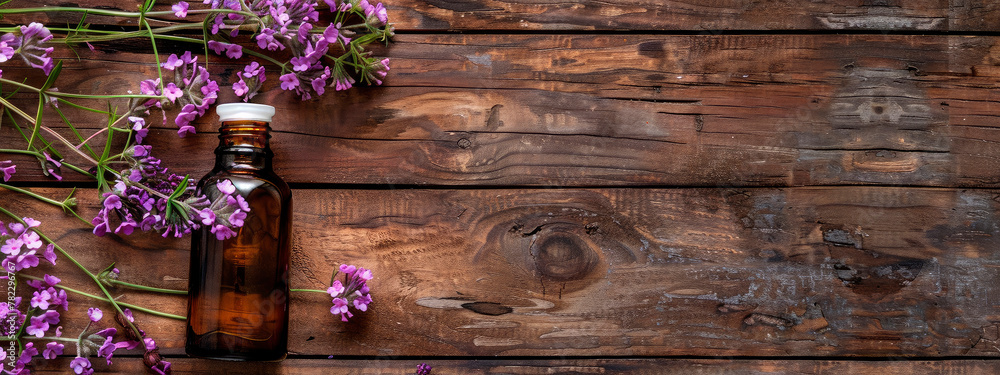 Fototapeta premium verbena essential oil in a bottle. selective focus.