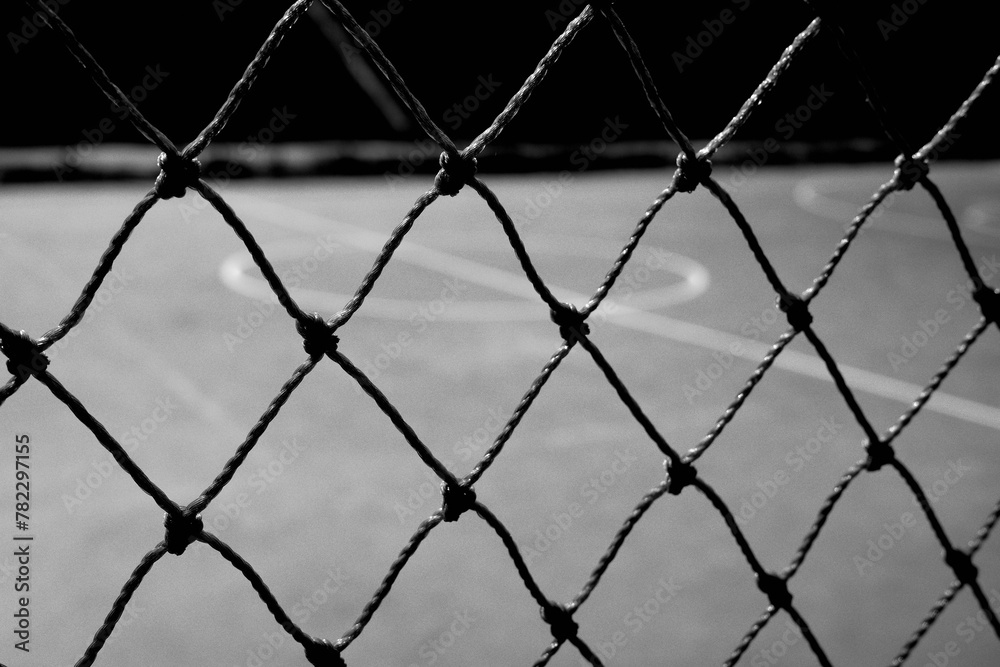 Naklejka premium wire fence around basketball court