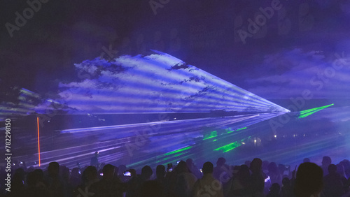 Laser show over the crowd at the party © MEDIAIMAG