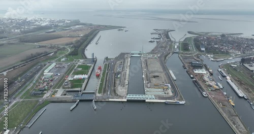 Sluizencomplex Terneuzen, or Noordzeesluizen, in Terneuzen , The Netherlands. Provides access to inland shipping channel. Ghent, Terneuzen Canal. Industrial maritime shipping route infrastructure. photo