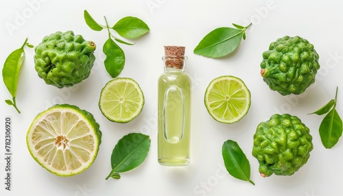 Bergamot oil and kaffir fruit isolated on white background photo