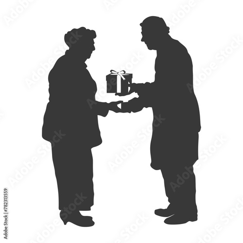 Silhouette elderly couple exchanging gifts black color only