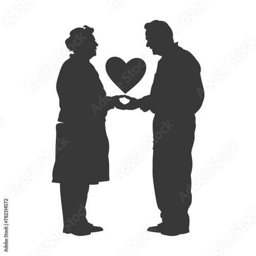 Silhouette elderly couple holding heart symbol black color only