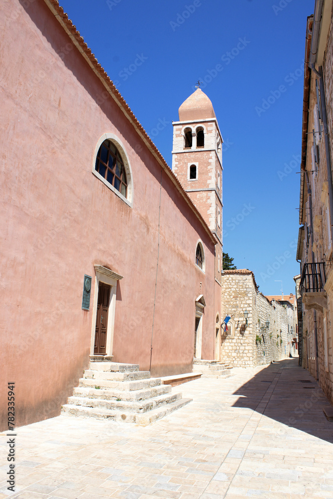 the lovely pink church in the old town of Rab, island Rab, Croatia