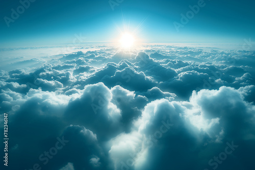 Celestial Radiance: Sunburst Above the Clouds. the breathtaking view of the sun's rays piercing through a sea of clouds, invoking a sense of infinite possibility and the vast beauty of the sky.