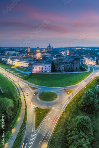 Vertical panoramic aerial night view of the skyline of city of Mantua, Lombardy, Italy