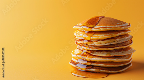 Delicious Stack of Pancakes with Maple Syrup