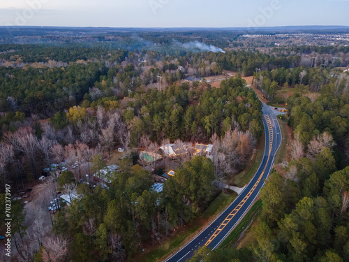 Aerial sunset landscape of forest and William Few Parkway in Evans Augusta Georgia