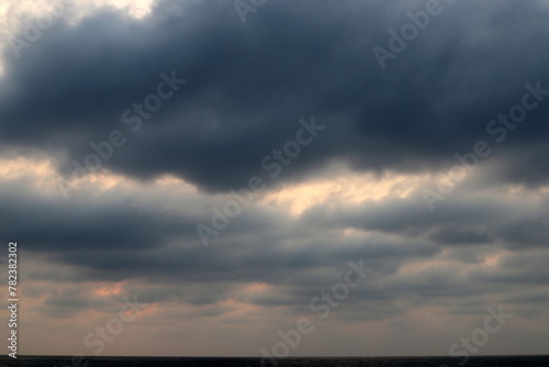 Rain clouds in the sky over the Mediterranean Sea.