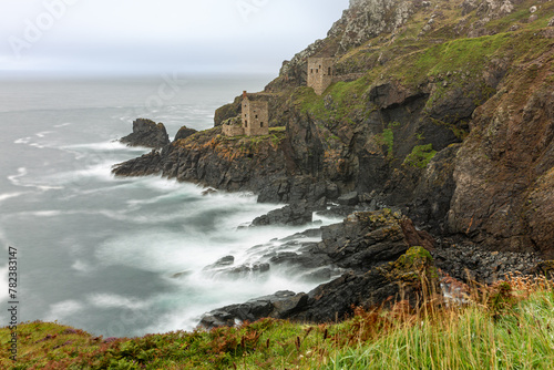 A coastal landscape on the west of Cornwall, with the rugged coastline and old mines