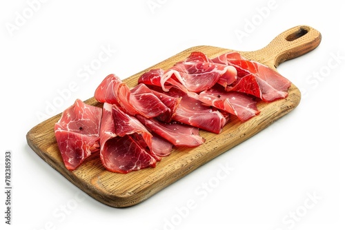 Isolated white background with Spanish serrano ham on cutting board