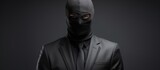 Masked businessman in balaclava and black tie