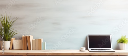 Laptop on Desk Near Plant