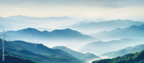 Misty mountains from high altitude © vxnaghiyev