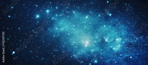 Blue galaxy with stars on dark background
