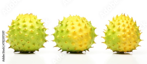 Three assorted fruits displayed on a white surface