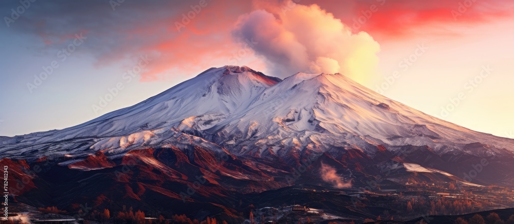 Sunset glow on snow-dusted Mount Etna